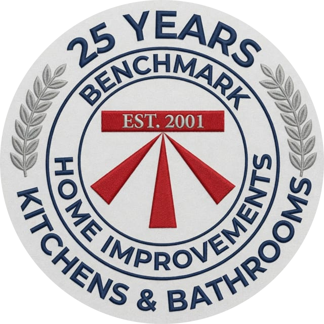 Benchmark Home Improvements 25 Years seal: Kitchens & Bathrooms, established 2001